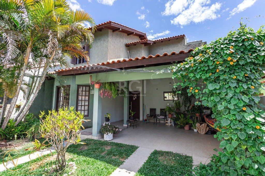 Casa à venda com 4 quartos, 170m², 2 suítes, 2 vagas, Rua Jayme Saul de Borba no bairro Espírito Santo em Porto Alegre