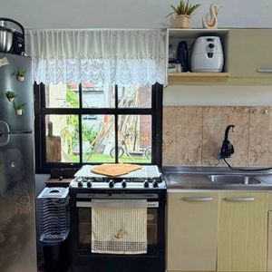 Casa com 300m², 4 dormitórios, 1 suíte no bairro Getúlio Vargas em Torres para Comprar