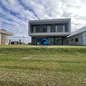 casa a venda em condominio torres rs