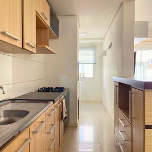 Apartamento com 88m², 2 dormitórios, 1 suíte, 1 vaga no Villa Real em Torres para Comprar