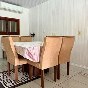 Casa com 130m², 2 dormitórios, 2 vagas no bairro Praia da Cal em Torres para Comprar