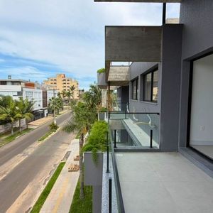 Apartamento com 79m², 2 dormitórios, 1 suíte, 2 vagas no Florença em Torres para Comprar