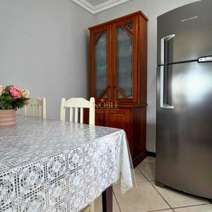 Casa com 145m², 3 dormitórios, 1 suíte, 2 vagas no bairro Igra Sul em Torres para Comprar