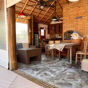 Casa, 4 dormitórios, 2 suítes, 3 vagas no bairro Praia Grande em Torres para Comprar