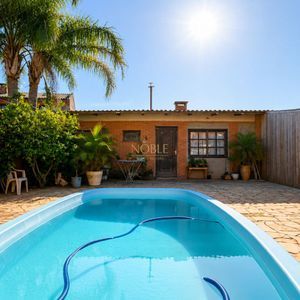 Casa, 6 dormitórios, 1 suíte, 4 vagas no bairro Stan em Torres para Comprar