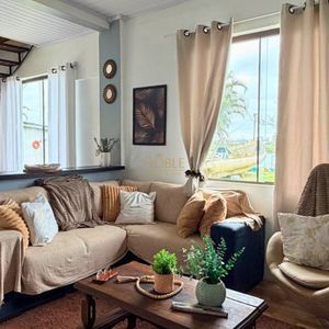 Casa com 300m², 4 dormitórios, 1 suíte no bairro Getúlio Vargas em Torres para Comprar