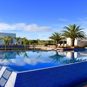 Casa de Condomínio com 350m², 4 dormitórios, 4 suítes, 2 vagas no Reserva das Águas em Torres para Comprar