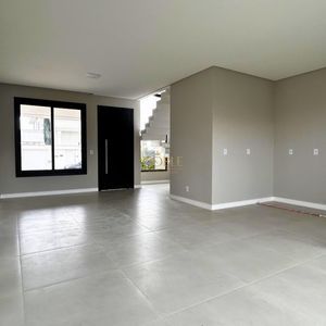 Casa com 140m², 3 dormitórios, 1 suíte, 2 vagas no bairro Morada das Palmeiras em Torres para Comprar