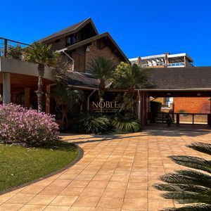 Casa, 4 dormitórios, 2 suítes, 3 vagas no bairro Praia Grande em Torres para Comprar