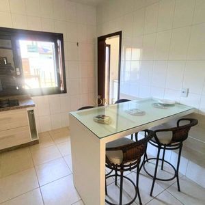 Casa com 240m², 4 dormitórios, 2 suítes, 2 vagas no bairro Praia Paraíso em Torres para Comprar