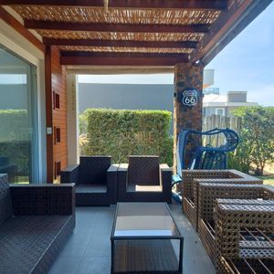 Casa com 210m², 3 dormitórios, 3 suítes, 2 vagas no Ocean Side em Torres para Comprar