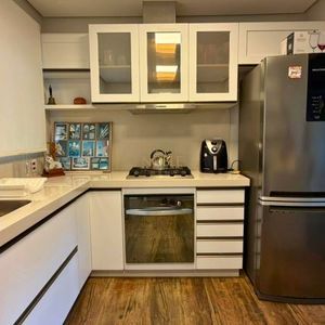 Casa com 200m², 3 dormitórios, 1 suíte, 2 vagas no bairro Praia Grande em Torres para Comprar