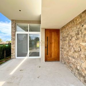 Casa de Condomínio com 180m², 4 dormitórios, 4 suítes, 2 vagas no Condomínio Ilhas Park em Torres para Comprar