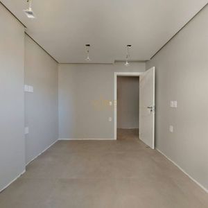 Apartamento com 114m², 3 dormitórios, 1 suíte, 2 vagas no Titanium em Torres para Comprar