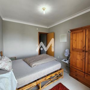 Sobrado e 2 dormitórios no bairro Capão Novo em Capão da Canoa para Comprar