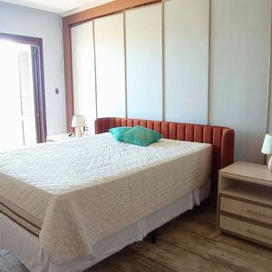 Casa com 500m², 4 dormitórios, 4 suítes, 2 vagas no bairro Bella Torres em Passo de Torres para Comprar