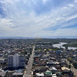 Apartamento com 121m², 3 dormitórios, 3 suítes, 1 vaga no Punta Del Sole em Torres para Comprar