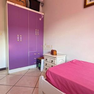 Casa com 145m², 3 dormitórios, 1 suíte, 2 vagas no bairro Igra Sul em Torres para Comprar