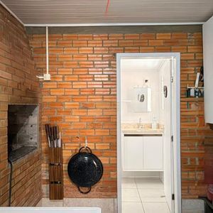 Casa com 98m², 3 dormitórios, 2 vagas no bairro Praia da Cal em Torres para Comprar