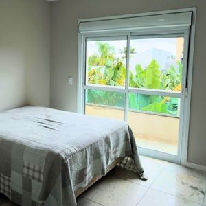 Sobrado com 127m², 3 dormitórios, 1 suíte, 1 vaga no Ilhas Travertino em Torres para Comprar