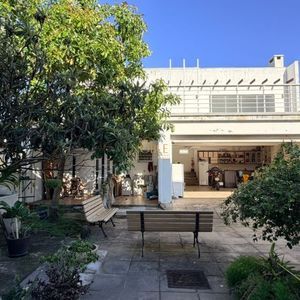 Casa com 400m², 5 dormitórios, 1 suíte, 4 vagas no bairro Stan em Torres para Comprar