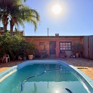Casa, 6 dormitórios, 1 suíte, 4 vagas no bairro Stan em Torres para Comprar