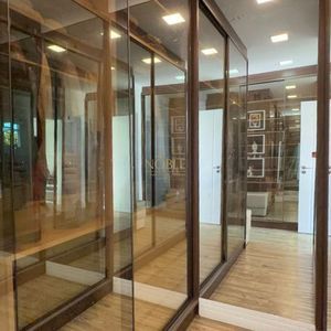 Casa com 400m², 5 dormitórios, 1 suíte, 4 vagas no bairro Stan em Torres para Comprar