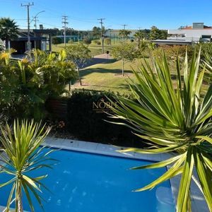 Casa de Condomínio com 338m², 4 dormitórios, 3 suítes, 2 vagas no Ocean Side em Torres para Comprar