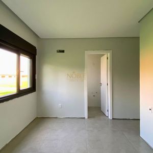 Casa com 201m², 3 dormitórios, 3 suítes, 2 vagas no Reserva das Águas em Torres para Comprar
