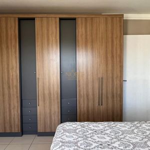 Sobrado com 290m², 4 dormitórios, 1 suíte, 2 vagas no bairro Igra Norte em Torres para Comprar