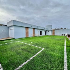 Casa com 670m², 5 dormitórios, 3 suítes, 3 vagas no bairro Bellatorres em Passo de Torres para Comprar