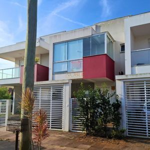 Geminado com 115m², 3 dormitórios, 1 suíte, 1 vaga no bairro Morada das Palmeiras em Torres para Comprar