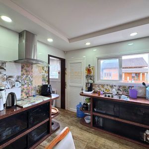 Casa com 180m², 3 dormitórios, 2 suítes, 2 vagas no bairro Caravelle em Passo de Torres para Comprar