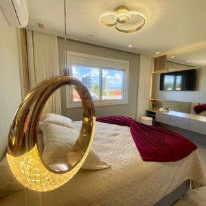 Apartamento com 155m², 3 dormitórios, 1 suíte, 2 vagas no Morada do Parque em Torres para Comprar