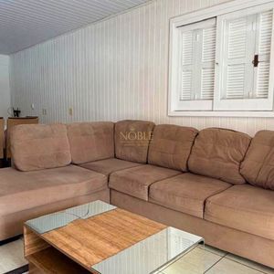 Casa com 130m², 2 dormitórios, 2 vagas no bairro Praia da Cal em Torres para Comprar