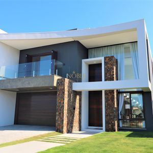 Casa de Condomínio com 301m², 4 dormitórios, 4 suítes, 2 vagas no Reserva das Águas em Torres para Comprar