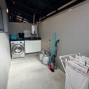 Casa, 2 dormitórios, 2 suítes, 1 vaga no bairro Morada das Palmeiras em Torres para Comprar