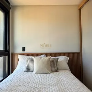 Apartamento com 64m², 2 dormitórios, 1 suíte, 1 vaga no Aston em Torres para Comprar
