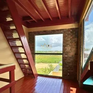 Casa com 108m², 2 dormitórios, 2 vagas no bairro Capão do Cravo em Passo de Torres para Comprar
