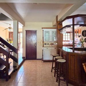 Casa com 193m², 3 dormitórios, 1 suíte, 3 vagas no bairro Praia Grande em Torres para Comprar