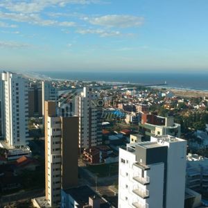 Apartamento com 216m², 4 dormitórios, 4 suítes, 4 vagas no Golden Tower em Torres para Comprar
