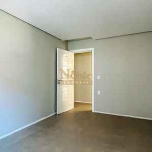 Apartamento com 119m², 3 dormitórios, 1 suíte, 2 vagas no Titanium em Torres para Comprar