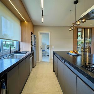 Casa de Condomínio com 435m², 4 dormitórios, 4 suítes, 4 vagas no Ocean Side em Torres para Comprar