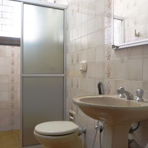 Casa com 260m², 5 dormitórios, 1 suíte, 2 vagas no bairro Praia Grande em Torres para Comprar