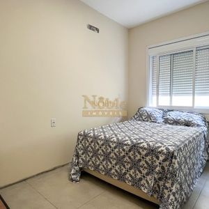 Geminado com 103m², 3 dormitórios, 1 suíte, 2 vagas no bairro Morada das Palmeiras em Torres para Comprar