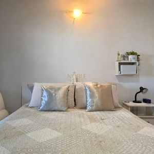 Casa com 228m², 3 dormitórios, 1 suíte, 2 vagas no bairro Stan em Torres para Comprar