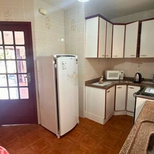 Casa, 6 dormitórios, 2 vagas no bairro Praia da Cal em Torres para Comprar