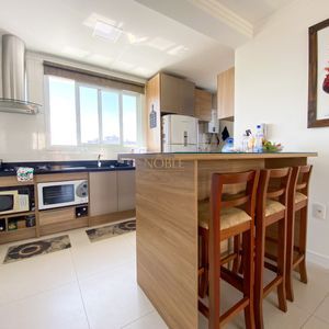 Apartamento com 70m², 2 dormitórios, 1 suíte, 1 vaga no Monet em Torres para Comprar