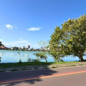 Sobrado com 199m², 3 dormitórios, 3 suítes, 2 vagas no bairro Praia da Cal em Torres para Comprar