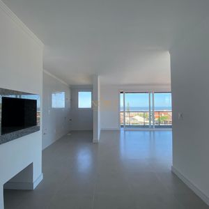 Apartamento com 88m², 2 dormitórios, 1 suíte, 2 vagas no Residencial Acrópole em Torres para Comprar